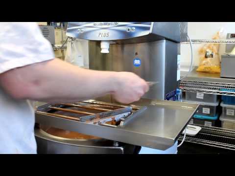 Chocolate tempering and forming into lollies by Choc Affair in York, UK - video from Choc Affair