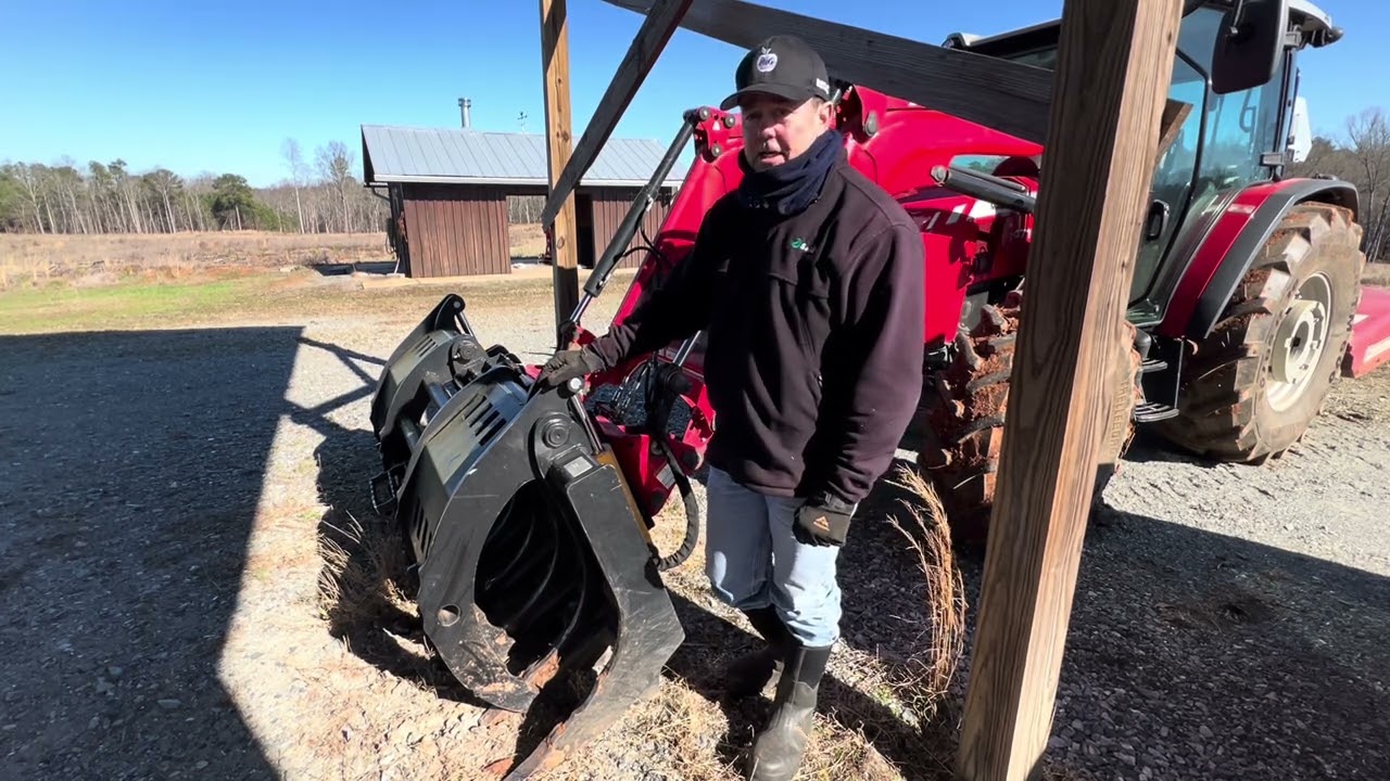 Firebreak clean up with extreme duty grapple rake on a Massy Ferguson 4710 tractor 