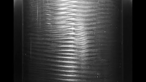 Instability of Taylor-Couette flow with manually driven inner cylinder [(1/4)X speed]