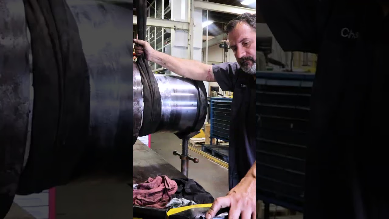 Sliding the rod and piston out of a Rougher top spindle balance Cylinder