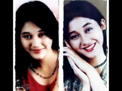 Nike Ardilla Cinta Diantara Kita Lyrics English Translation