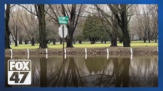 Red Cedar River continues to overflow into local communities