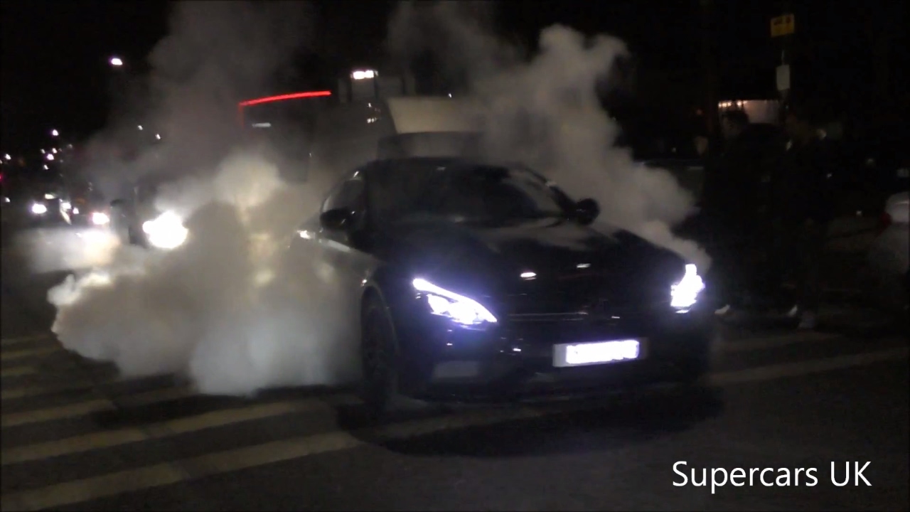 MASSIVE BURNOUTS from Mercedes C63 AMG at ACE CAFE