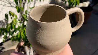 Pottery: Successfully throwing and trimming a mug