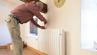 Installer un radiateur électrique à chaleur douce (fluide caloporteur) - Bricolage avec Robert