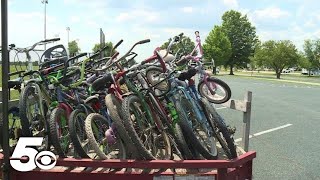 Bentonville hosts 'bike drive' to give away 150 bicycles for its anniversary