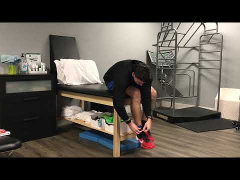 Seated Knee Traction Mobilization With Ankle Weights
