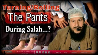 Turning/Rolling the pants during Salah? || Answer by Dr. Zahoor Ahmad Malik Al'Madni.