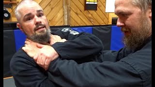 Defending a front choke. Small circle jujitsu