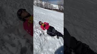Skier attempts backflip from ramps then lands awkwardly on his back