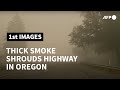 Thick smoke from wildfires shrouds highway in Oregon | AFP