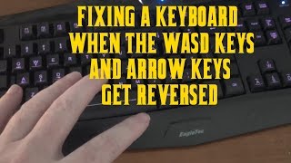 how to fix a keyboard when the wasd keys & arrow keys get flipped