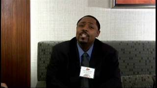 Coach Lynn talks with Rev. Terry Weston about faith-based re-entry fatherhood programs