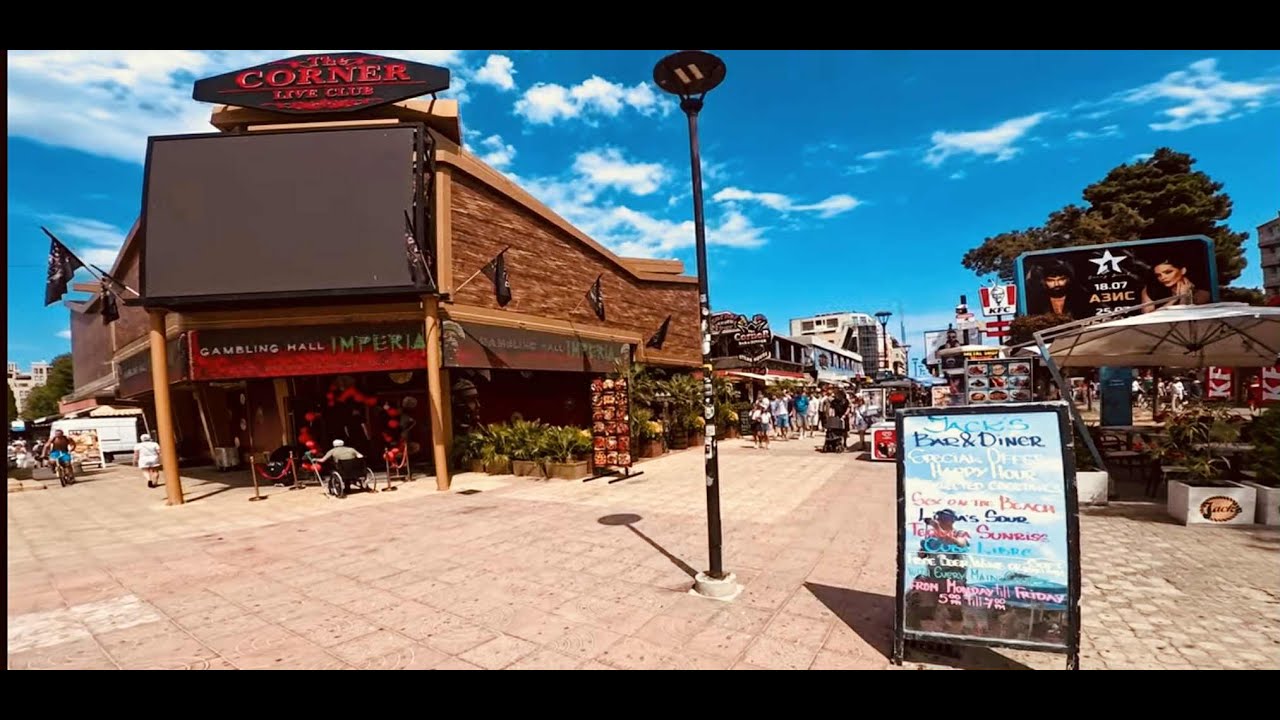 Walking in sunny beach in july 2025