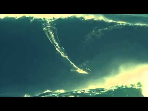 Garrett McNamara breaks world record surfing 100 foot wave!