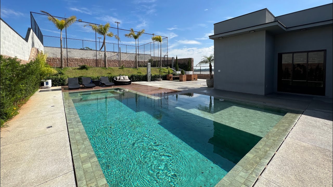 CASA A VENDA EM CONDOMÍNIO FECHADO EM INDAIATUBA 4 SUÍTES ESCRITÓRIO PISCINA TERRENO GRANDE