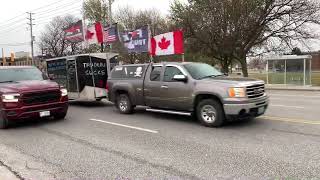 Hundreds of trucks with Canadian flags protest in Windsor, United Kingdom against Covid restrictions