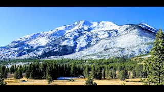 Backcountry hike up Mount Sheridan in Yellowstone National Park via Heart Lake and geyser basin.