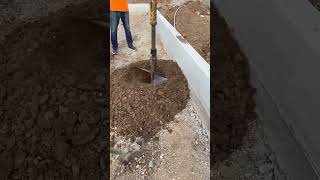 Digging holes with an auger
