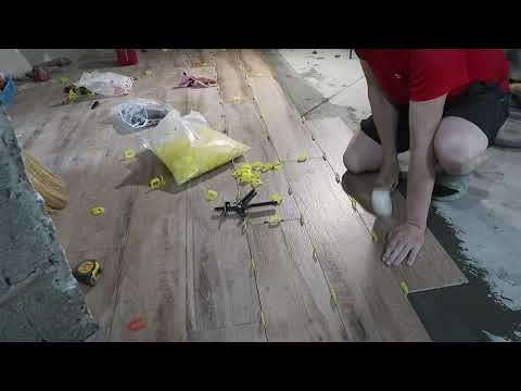Laying 1200 x 200 porcelain tiles under laminate.