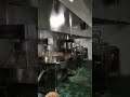 Industrial planetary cooking kettle in action—precision mixing for premium hot pot base production.