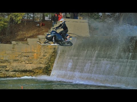 INSANE Snowmobile Dam Jump!!!