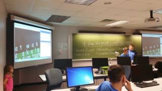 Carter and teammate present their Techie Camp creation.