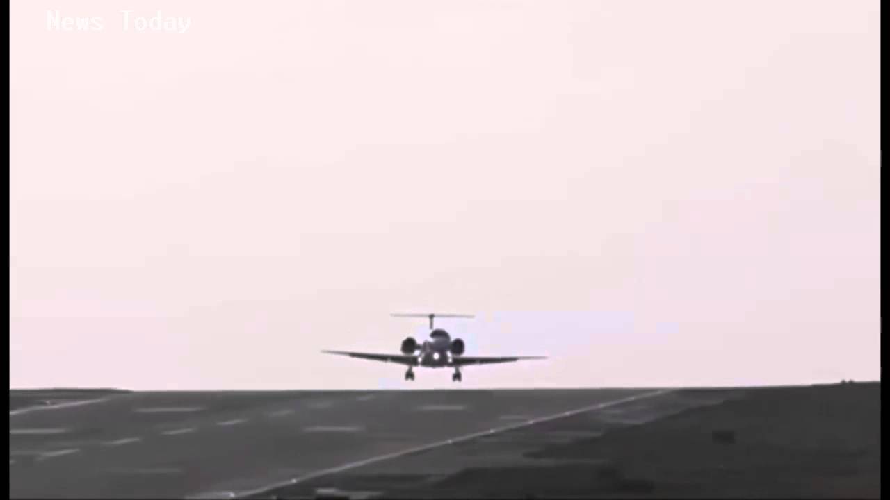 Watch terrifying moment plane lands sideways in high winds - YouTube