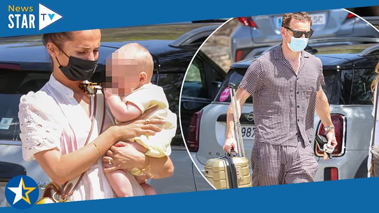Alicia Vikander cradles a baby during holiday with husband Michael