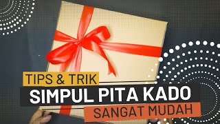 Cara Mengikat Tali Pita Untuk Bungkus Kado