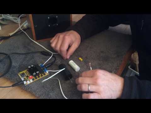 What is a capacitor doing in a loudspeaker ?
