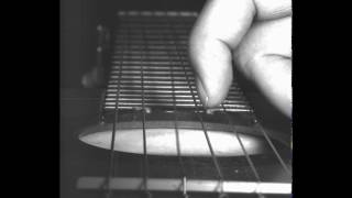 Slow motion: Plucking a guitar string