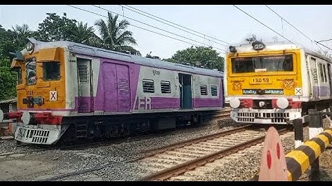 Crossing : Different Model EMU Local Trains at busy Railgate