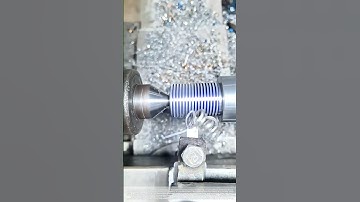 Cutting the Spiral: How a Lathe Forges Precision from Solid Steel