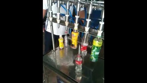 Máy chiết rót 6 vòi, chiết rót chai nước,chiết rót chai rượu,chiết rót nước hoa quả