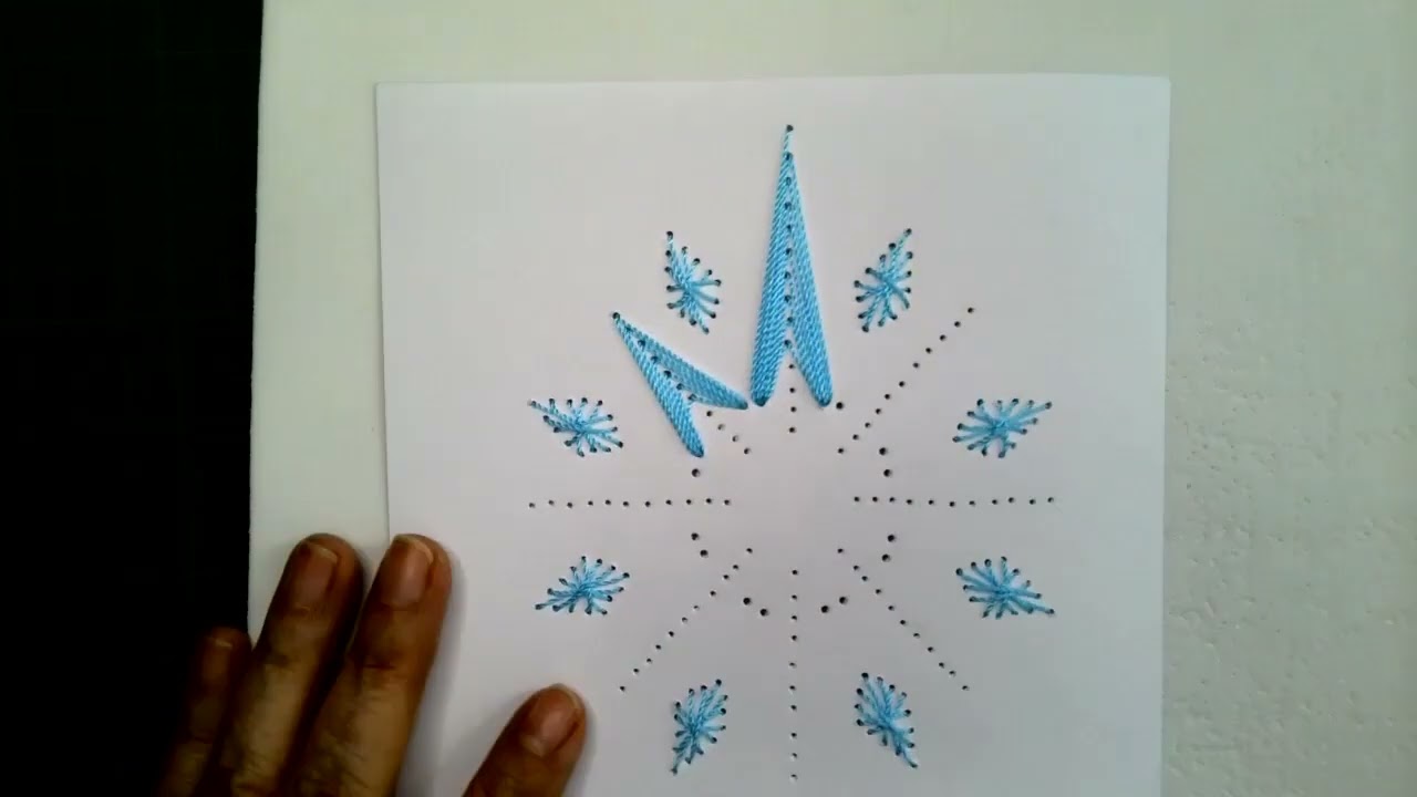 Estrella Navideña bordada en papel