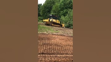 61 KOMATSU DOZER TAKES DOWN TREES!