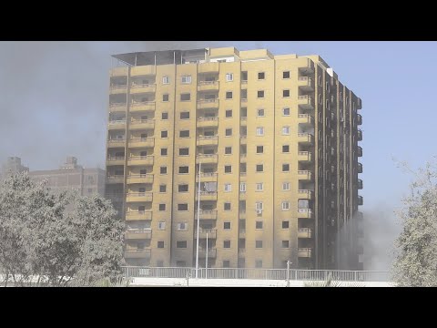 سكان البرج المنكوب بفيصل عايشين في الشارع والبرج مش هيقع