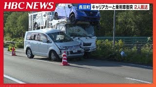A truck carrier and a passenger car collided head-on. Both male