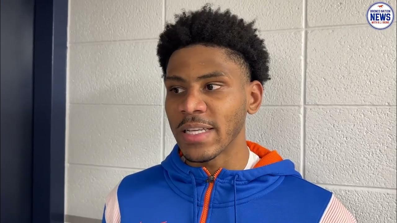 Chibuzo Agbo speaks to the media following an 8673 loss to Utah State