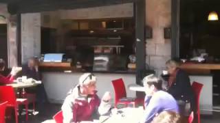 A funky version of their typically upscale "Starbucks " - "aroma"