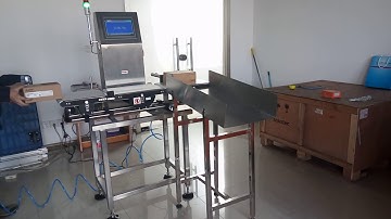 Zegoo in-motion checkweigher with rejector bin