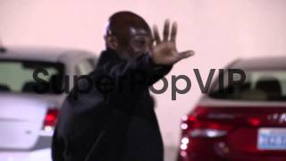 Peter Mensah greets fans at the Global Green USA's 10th A...