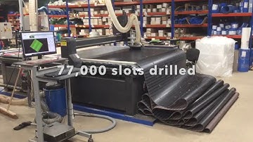 GB Belting automated CNC machine drilling 77,000 holes in a belt.