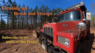 Mack DM Cleaning up Brush and Stumps on Our Property