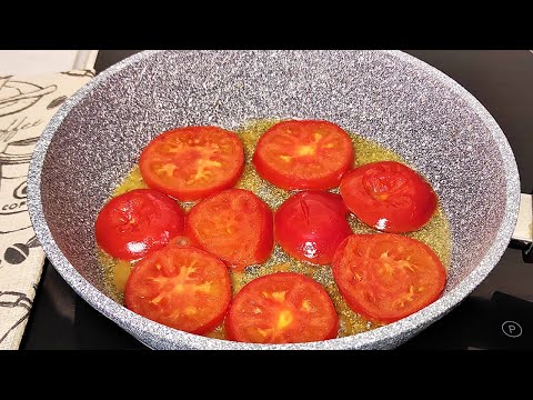 Delicious breakfast with tomatoes and eggs. A simple and quick recipe.
