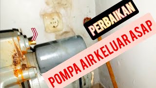 perbaikan pompa air keluar asap