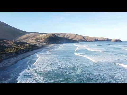 Empty waves at Allans Beach., Allans Beach surf spot, Dunedin / Otago, New Zealand.