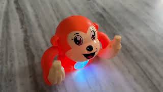 RYLAN Dancing Monkey Musical Toys for Kids Baby Spinning Rolling Doll