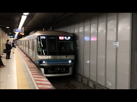 営団07系104編成が快速中野行きとして南砂町駅を通過するシーン